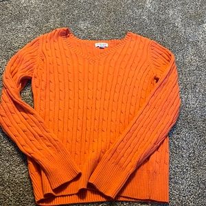 Orange cable knit sweater